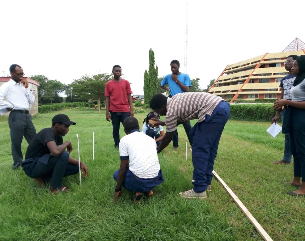 Image showing a group of MTE students working on a construction.